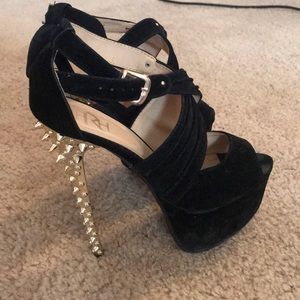 Black and gold heels